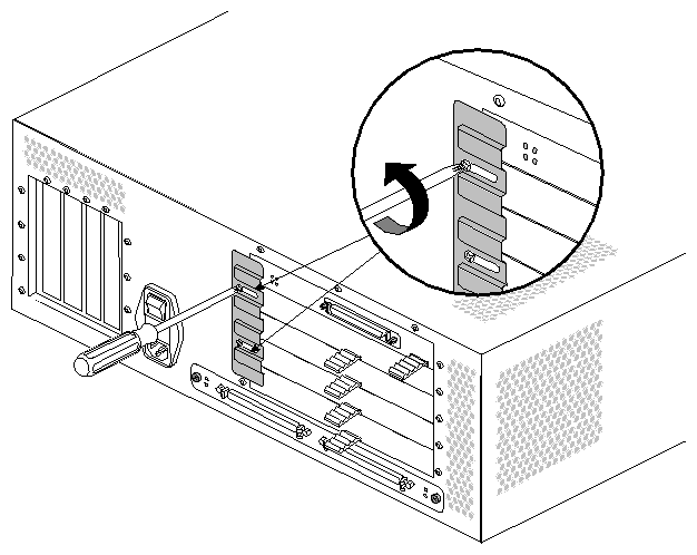 Figure 2-20 Loosening the XIO Board Retaining Plate