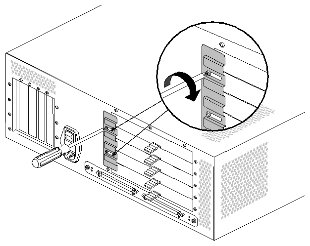 Figure 2-25 Tightening the XIO Retaining Plate Screws